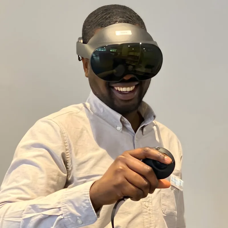 Emmanuel B. Boateng trying a mixed-reality headset